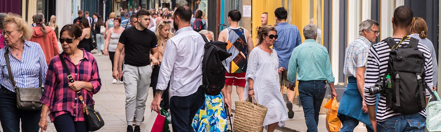 A view of the City of York shows people walking and shopping.