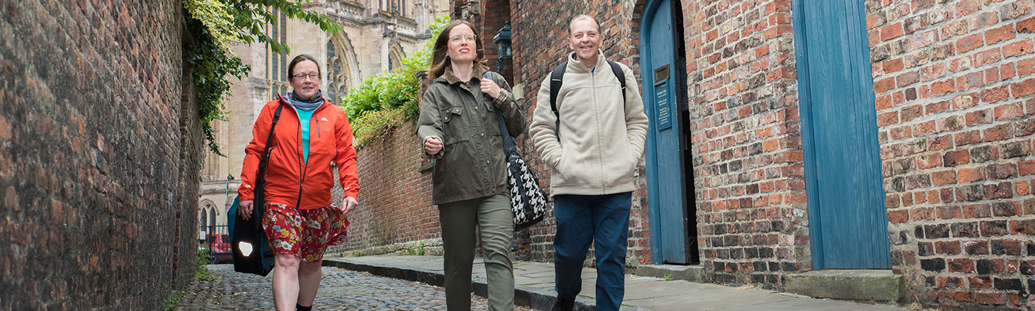 A view of the City of York shows people walking and shopping.